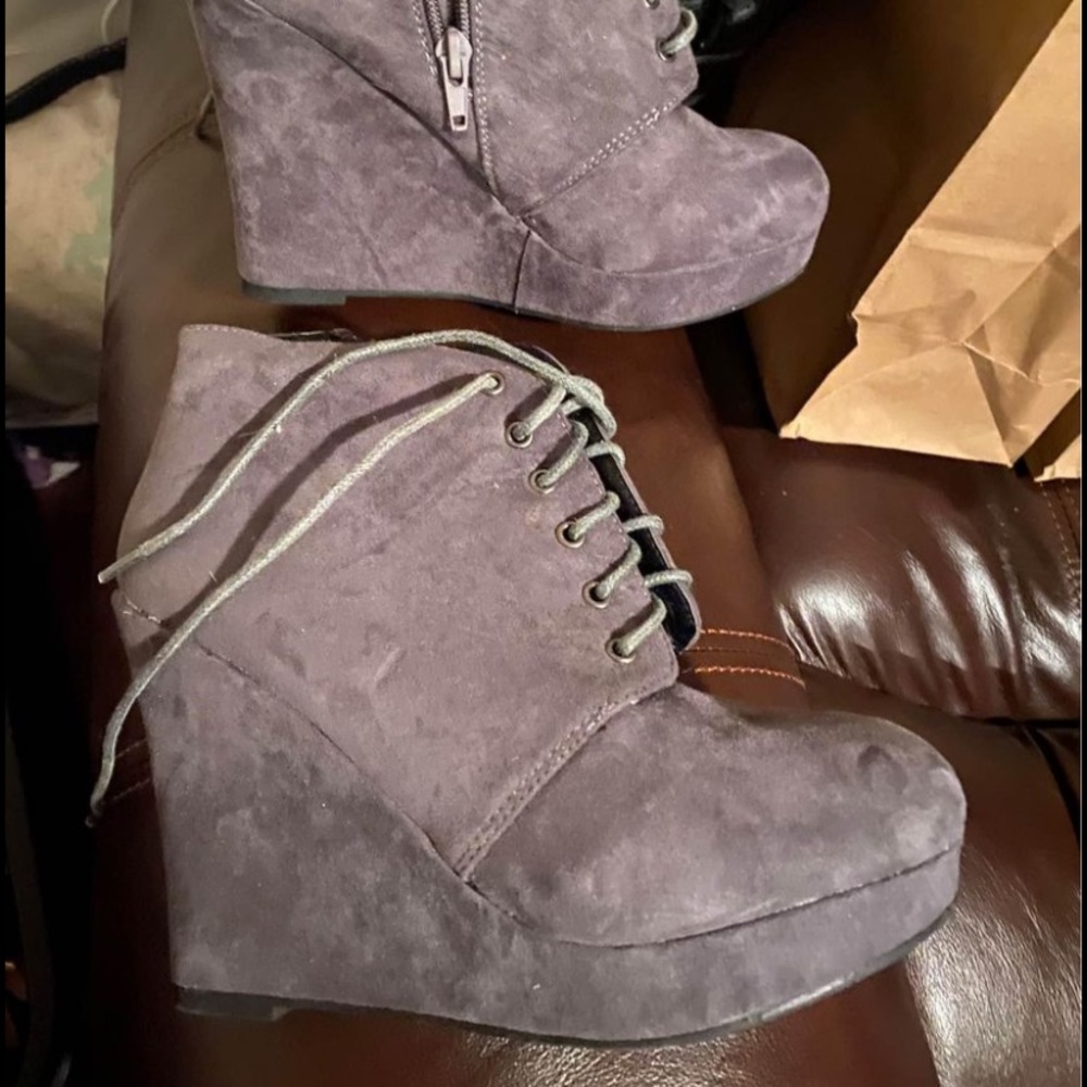 Woman’s wedge boots brand new never worn. Size seven